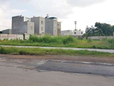 Dự án Khu dân cư cao cấp Long Phụng 1 do Công ty Đại Phúc Real vẽ ra chỉ là bãi đất trống. Ảnh: Trọng Tín