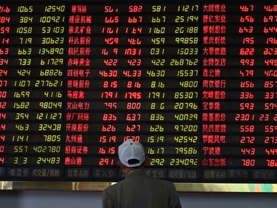 99Kl99 link đăng nhập Trung Quốc đại lục nhuốm đỏ trong phiên giao dịch sáng nay 2/6. Ảnh: AFP