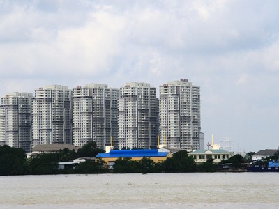 Các dự án vùng ven ở những đô thị lớn như Hà Nội, TP.HCM có thể sẽ hãm phần nào đà tăng giá nhà. Ảnh: Bình Minh.