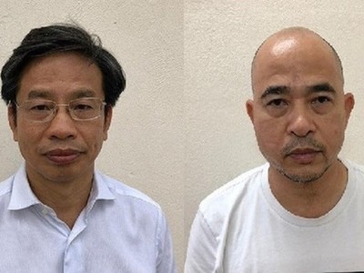 Bị can Nguyễn Xuân Sơn (trái) và Vũ Trọng Hải (phải)