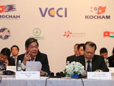 Bộ trưởng Bộ Kế hoạch và Kl99ok phiên bản mới Bùi Quang Vinh. Ảnh: Đức Thanh
