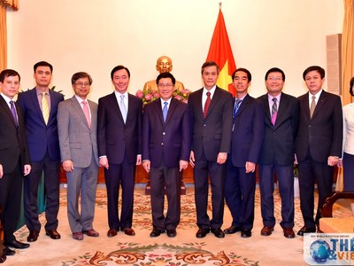 Phó Thủ tướng, Bộ trưởng Ngoại giao Phạm Bình Minh cùng các đại biểu dự lễ trao quyết định. Ảnh TGVN