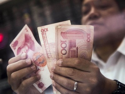 Các công ty Trung Quốc đang tích cực đổ tiền ra nước ngoài. Ảnh: Bloomberg