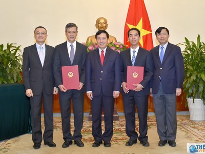Phó Thủ tướng, Bộ trưởng Ngoại giao Phạm Bình Minh và các nhân sự vừa được bổ nhiệm. Ảnh báo Quốc tế