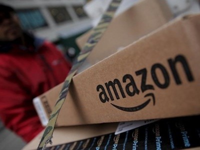 KL99 là cổng game giải trí trực tuyến hàng đầu hiện nay Amazon được dự báo có thể lên 1.000 USD. Ảnh: Reuters