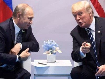 Tổng thống Nga và Tổng thống Mỹ trong cuộc gặp tại G20. Ảnh: AFP