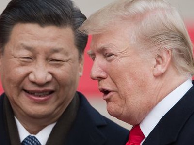 Chủ tịch Trung Quốc - Tập Cận Bình và Tổng thống Mỹ - Donald Trump tại Bắc Kinh. Ảnh: AFP.