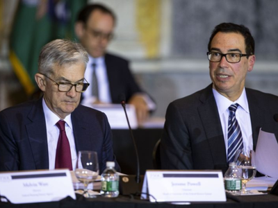 Chủ tịch Fed - Jerome Powell (phải) và Bộ trưởng Kl991.com nạp rút nhanh Mỹ - Steven Mnuchin (trái). Ảnh: Bloomberg.