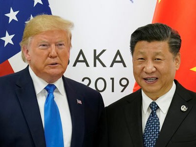 Tổng thống Mỹ Donald Trump (trái) và Chủ tịch Trung Quốc Tập Cận Bình tại cuộc gặp bên lề hội nghị G20 ở Osaka ngày 29/6. Ảnh: Reuters.