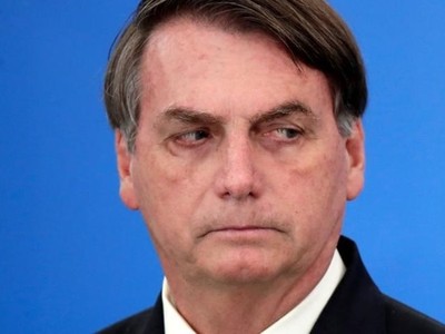 Tổng thống Brazil Bolsonaro công bố các biện pháp Kl992 cổng game cá cược trong đại dịch Covid-19 ở tại Brasilia hôm 27/3. Ảnh: Reuters.