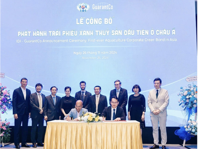 Ông Lê Tuấn Anh, Tổng giám đốc Sao Mai Group (ngồi bên phải ) cùng lãnh đạo GiarantCo ký kết Biên bản ghi nhớ tại Lễ Công bố. 