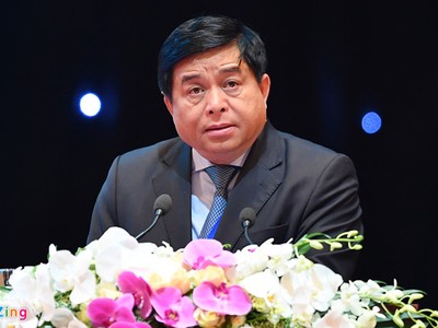 Bộ trưởng Bộ Kế hoạch và Kl99ok phiên bản mới Nguyễn Chí Dũng phát biểu trong phiên khai mạc. Ảnh: Tiến Tuấn.
