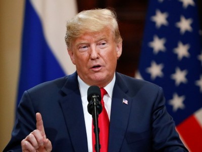 Tổng thống Trump phát biểu trong họp báo chung với người đồng cấp Nga Putin. Ảnh: Reuters.