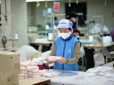 Kl994 nhà cái bóng đá world cup khẩu trang. (Ảnh: Đức Duy/Vietnam+).
