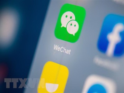 Biểu tượng WeChat trên một màn hình điện thoại. (Ảnh: AFP/TTXVN).