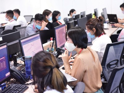 Nhà Kl99ok phiên bản mới bắt buộc phải có đủ tiền trước khi giao dịch là một trong những điểm khiến thị trường Việt Nam chưa được nâng hạng. Ảnh: Dũng Minh.