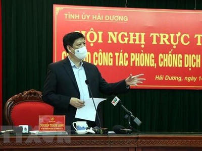 Ủy viên Trung ương Đảng, Bộ trưởng Bộ Y tế Nguyễn Thanh Long phát biểu tại hội nghị. (Ảnh: Mạnh Tú/TTXVN).