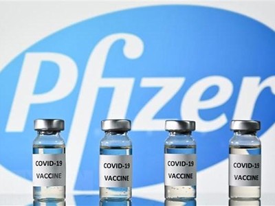 Vaccine do hãng dược Pfizer nghiên cứu và Kl994 nhà cái bóng đá world cup (Nguồn:TTXVN).