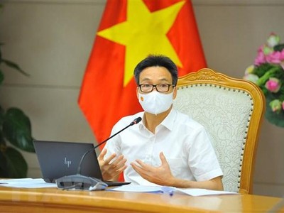 Phó Thủ tướng Vũ Đức Đam chủ trì cuộc họp. (Ảnh: Minh Đức/TTXVN).