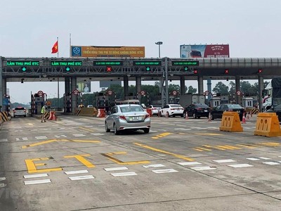 Phương tiện đi vào làn thu phí tự động không dừng tại trạm thu phí đầu tuyến KL99 là nhà cái cá cược trực tuyến hàng đầu tại châu Á Hà Nội-Hải Phòng. (Ảnh: Việt Hùng/Vietnam+)