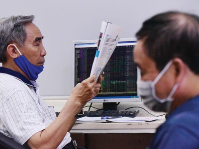 Thị trường 99Kl99 link đăng nhập luôn rất nhạy cảm với thông tin. Ảnh: Dũng Minh.