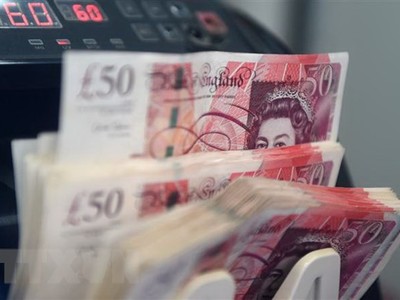 Đồng tiền mệnh giá 50 bảng Anh. (Ảnh: AFP/TTXVN)