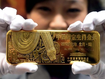 Nhà Kl99ok phiên bản mới Trung Quốc đang mạnh tay mua vàng, khiến giá không ngừng tăng. Ảnh: AFP