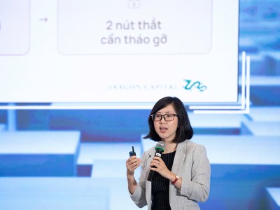 Bà Đặng Nguyệt Minh, Giám đốc Nghiên cứu Dragon Capital trình bày tham luận tại hội thảo. Ảnh: Dũng Minh