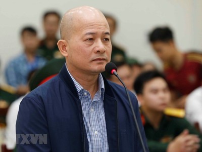 Đinh Ngọc Hệ tại phiên tòa trước. Ảnh TTXVN.