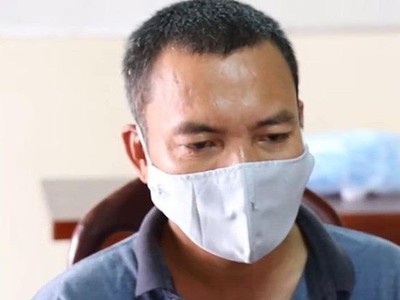 Ông Toàn khi bị bắt. Ảnh: Tuổi trẻ