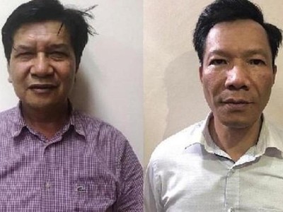Các bị can Trần Ngọc Hà (trái) và Vũ Quang Tâm. 