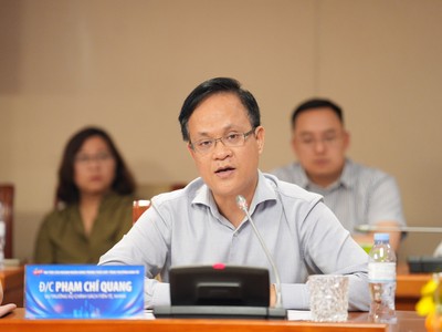 Ông Phạm Chí Quang, Vụ trưởng Vụ Chính sách tiền tệ (NHNN) trao đổi tại Toạ đàm
