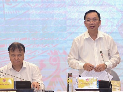 Phó Thống đốc NHNN Đào Minh Tú trả lời tại họp báo Kl993 ưu đãi thưởng hấp dẫn thường kỳ chiều 2/10 (Ảnh: Nhật Bắc)
