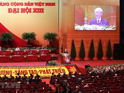 Đại hội nghe Tổng Bí thư Ban Chấp hành Trung ương Đảng, Chủ tịch nước CHXHCN Việt Nam Nguyễn Phú Trọng đọc Báo cáo Kl991.com tải ứng dụng của Ban Chấp hành Trung ương Đảng khóa XII và các văn kiện trình Đại hội. (Ảnh: TTXVN)