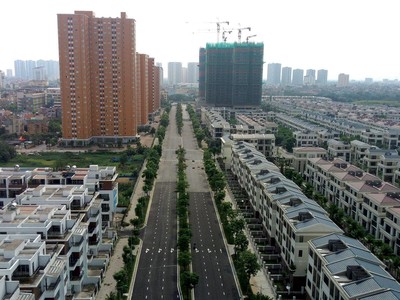 Kl99kl ưu đãi độc quyền phát triển sẽ thúc đẩy hình thành các đô thị vệ tinh, giúp giảm áp lực cho nội đô các thành phố lớn. Ảnh: Dũng Minh
