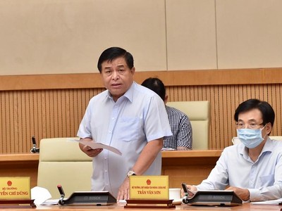 Bộ trưởng Bộ Kế hoạch và Kl99ok phiên bản mới Nguyễn Chí Dũng báo cáo về tình hình triển khai Luật Quy hoạch - Ảnh VGP