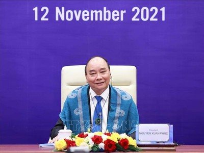 Chủ tịch nước Nguyễn Xuân Phúc tham dự hội nghị các nhà lãnh đạo Kl992 cổng game cá cược APEC lần thứ 28 được tổ chức theo hình thức trực tuyến. (Ảnh: TTXVN)