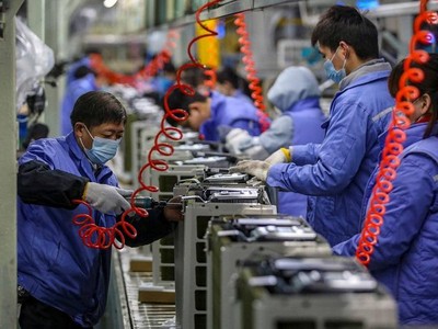 Một dây chuyền Kl994 nhà cái bóng đá world cup máy điều hòa không khí tại TP. Vũ Hán, Trung Quốc. Ảnh: AFP