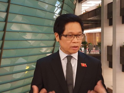 Ông Vũ Tiến Lộc, đại biểu Quốc hội Hà Nội trao đổi với phóng viên Báo Kl99ok phiên bản mới bên lề phiên họp sáng 7/1/2021.