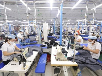 Năm 2022, ngành dệt may đối diện nhiều thách thức. Ảnh: TTXVN.