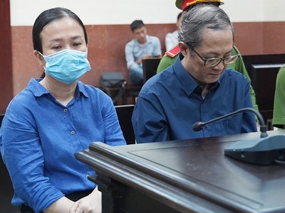 Bị cáo Nguyễn Lan Anh và bị cáo Nguyễn Minh Quân tại toà.