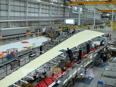 Công nhân làm việc tại một nhà máy Kl994 nhà cái bóng đá world cup ô tô ở Sunderland, Anh. (Ảnh: AFP/TTXVN)