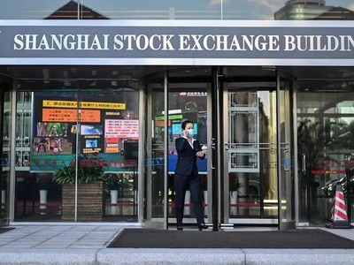Bên ngoài tòa nhà Sở Giao dịch 99Kl99 link đăng nhập Thượng Hải, Trung Quốc. Ảnh: AFP 