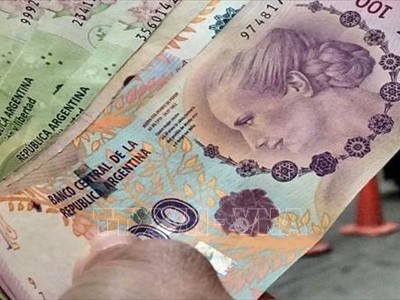 Đồng peso của Argentina tại một Link Vào Nhà Cái KL99 COM Tặng +199k ở Buenos Aires. Ảnh tư liệu: Reuters/TTXVN