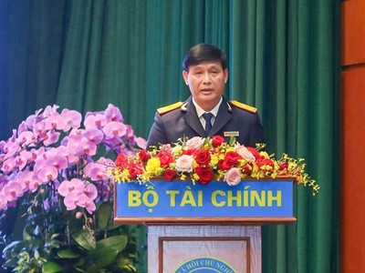 Phó Cục trưởng Cục Thuế Đặng Ngọc Minh báo cáo tại Hội nghị tổng kết công tác năm 2025, triển khai nhiệm vụ năm 2026 ngành Kl991.com nạp rút nhanh tổ chức ngày 6/1. Ảnh: Đức Thanh.