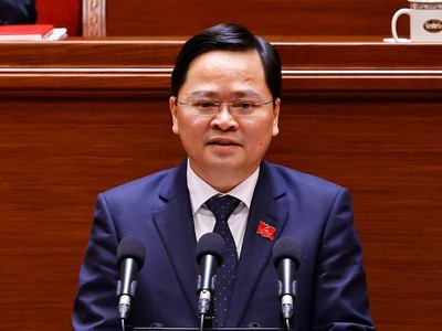 Phó Trưởng Ban Chính sách, chiến lược Trung ương Nguyễn Anh Tuấn trình bày tham luận - Ảnh: TTXVN. 