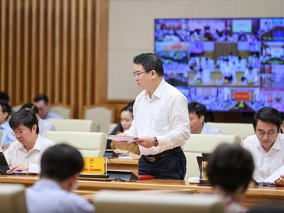  Thứ trưởng Bộ Kl991.com nạp rút nhanh Trần Quốc Phương báo cáo tại Hội nghị. Ảnh: VGP