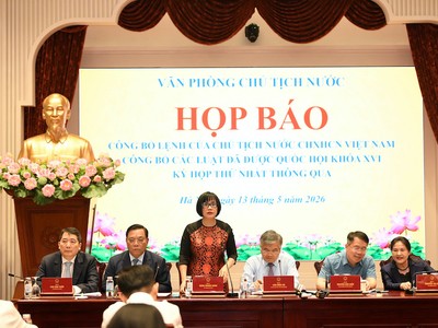 Thứ trưởng Bộ Tư pháp Đặng Hoàng Oanh thông tin điểm mới của Luật Công chứng - Ảnh: NY.