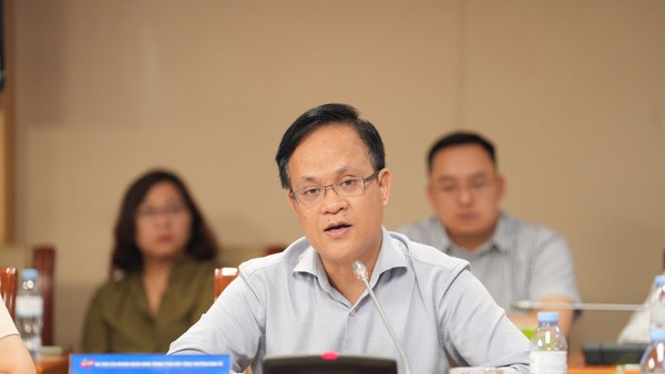 Ông Phạm Chí Quang, Vụ trưởng Vụ Chính sách tiền tệ (NHNN) trao đổi tại Toạ đàm