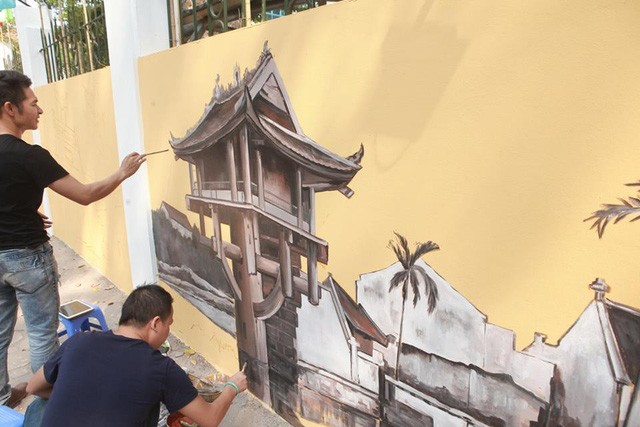 Ngỡ ngàng phố bích họa tái hiện Hà Nội xưa trên phố Phan Đình Phùng ảnh 2 Ngỡ ngàng phố bích họa tái hiện Hà Nội xưa trên phố Phan Đình Phùng ảnh 2